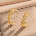 Golden C-shaped stud earrings with punk rivet texture and sparkling white zircon inlays - Gold Earrings