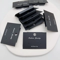 Black paper jewelry display cards for earrings featuring Fashion Jewelry text branding - Black-925 Label 2 Holes