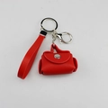 Detail van een rode PU-leren mini-portemonnee-sleutelhanger - Rood