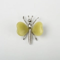 Natural light green crystal butterfly ornament with heart-shaped stone wings and silver alloy body - Lemon Jade