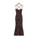 Detail of cross back straps and 3D floral embroidery on a dark brown evening maxi dress - Coffee