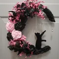 Pink and black rose crescent moon wreath with a black cat silhouette for wall decor - Pink Flowers & Black Roses