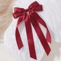 Vibrant red double-layered satin ribbon bow hair clip on a white textured background - Red (33)