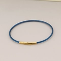 Blue steel wire cable bracelet with a golden stainless steel snap clasp closure - Blue Rope Gold Clasp