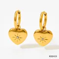 Elegant gold heart hoop earrings with sparkling zircon center and radiant sunburst carving - Gold Starburst Rhinestone Heart Hoop Earrings (KDE419)