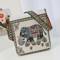 Ethnic beige canvas crossbody bag with vibrant elephant embroidery and colorful strap - Beige Elephant