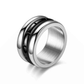 Close-up of men's titanium steel ring with silver edges and textured black center band - US 6 / 12mm Spinning Industrial Style Black (4858338541848)