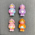 Set of four colorful astronaut slow rebound squishy toys in pink, blue, and purple hues - Small Astronaut 7.5cm