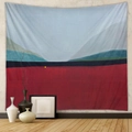 Close-up of bohemian wall tapestry with abstract red and blue landscape art in a room - Design CX0327-33