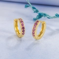 14K gold plated huggie hoop earrings featuring single row small pink crystals - Gold Tone with Red Zirconia