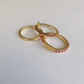 Three-piece set of elegant gold rings with pink rhinestones on a white background - Spec 3 (Pink Gemstone)
