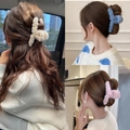 Plush faux fur shark hair claw clips in beige, blue, and pink for women's hairstyling - White Blue Pink Plush Hair Claw 3-Piece Set