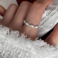 Close-up of minimalist 925 sterling silver shell ring worn by model on finger - JZ0857-Metal Shell