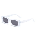 Retro rectangular sunglasses with frosted transparent frames and dark lenses shown at 45 degrees - White Frame Gray Lens