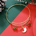 Adjustable gold Christmas bracelet with Santa charm, red and green beads on pine background - Moon Santa (D1364)