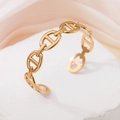 Minimalist gold stainless steel open bangle featuring a classic anchor chain design - Anchor Chain / Gold