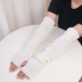 Soft white knit arm warmer sleeves with ribbed texture for winter protection - One Size / White