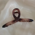 Matte dark brown gradient hair claw clip on soft beige silk fabric backdrop - Matte Tortoiseshell
