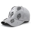 Silver-gray satin baseball cap featuring leaf sequin patches and sparkling rhinestones - Gray