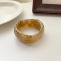 Minimalist wide amber resin bangle with retro tortoiseshell patterns and smooth finish - Dark Milk Coffee