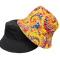 Reversible bucket hat featuring solid black fabric and vibrant tie-dye print patterns - 26 (Bohemian Swirl + Black)