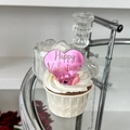 Pink heart-shaped Happy Valentine's Day mirror acrylic cupcake topper on white cream frosting - Valentine Heart / Mirror Rose Red