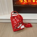 Detail of red knit phone bag with cartoon tiger and festive New Year patterns - Tiger Luck Red