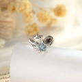 Silver star wing cartilage piercing with a light blue pentagram gemstone on a white stand - Single Piece / Light Blue (A989-3)