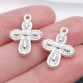 Pair of silver-plated cross pendants with intricate textured patterns for DIY jewelry - 18x13mm (1g)