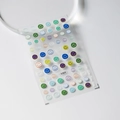 Minimalist colorful smiley face nail art sticker sheet in variant S-027F on clear base - Colored Relief Smiley (S-027F)