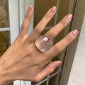 Close-up of translucent matte resin geometric square ring on finger for modern women - Frosted Pink Transparent