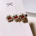 Elegant gold hair clip with red cherry beads and white pearls on white velvet background - Pearl Rhinestone Cherry