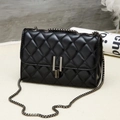 Detail of black quilted leather shoulder bag with gold chain strap and metal lock - 20*8*13 / Y-Lock Black