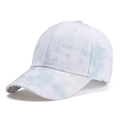 Detailed view of the blue and white tie-dye cotton fabric and stitching on baseball cap - One Size / Off-White