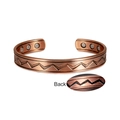 Detail view of adjustable magnetic copper bracelet with zigzag texture and healing magnets - Copper