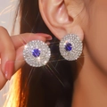 Luxurious round stud earrings with blue oval gemstone and sparkling white rhinestones - Blue Gem Round Cluster Style (DTE1216258S-J-BU)