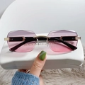 Frameless sunglasses with pink purple gradient lenses and gold metal accents - Gold Frame Grey Pink Lens Black Temple