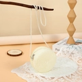 Mini round woven straw crossbody bag in cream white with spiral texture and zipper closure - 12cm / White