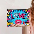 Canvas makeup bag with bright LOVE print and cartoon icons held by a hand - Pop Art LOVE Elements (jiayingpbb092)