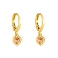 Macro shot of gold heart-shaped earrings featuring champagne zircon stones in detail - Champagne