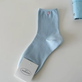 Light blue crew socks with pink button detail and soft knit texture for daily wear - One Size / Milk Blue