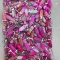 Bulk set of pink striped quartz crystal bullet pendants with silver metal clasps - Rose Red Agate