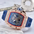 Rose gold tonneau watch with blue skeleton dial and diamond-set bezel on rubber strap - Dark Blue Dial Rose Gold Case Dark Blue Strap
