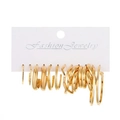Golden geometric earrings set featuring multiple sizes of round hoops on a display card - 45 KC Gold (1592)