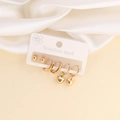 Detail of stainless steel gold earring set featuring heart charms and stud earrings - Gold Plain Hoop and Heart Pendant Style (6#)