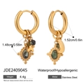 Detail of stainless steel earrings featuring gold star moon charms and green natural stone - Gold Star Moon Green Stone Style (JDE2409045)