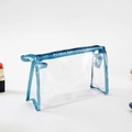 Clear PVC travel toiletry bag with metallic blue trim and zipper closure for cosmetics - Medium / Lake Blue