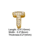 Macro detail of gold letter T pendant with zircon inlays and precise measurements - Letter T