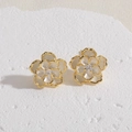 Macro shot of camellia flower stud earrings with gold plating and white enamel finish - XL2607-3 Camellia 14K Gold Plated
