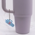 Light blue cup keychain with pink 3D butterfly hanging on a purple bottle handle - Blue Butterfly Cup Bead Chain
